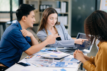  UX developer and ui designer brainstorming about mobile app interface wireframe design with customer breif and color code .