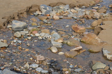 Obraz na płótnie Canvas Rock pool on the beach