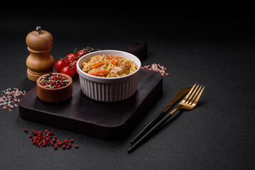 Delicious Uzbek pilaf with chicken, carrots, barberry, spices and herbs