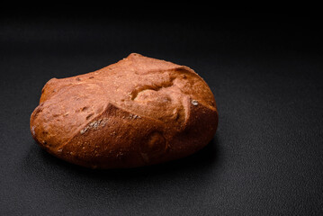 Delicious fresh crispy brown bread with seeds and grains
