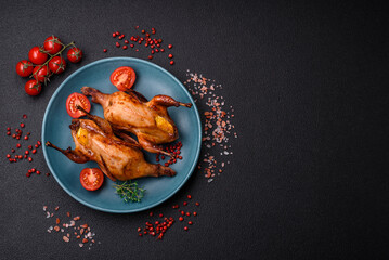 Roasted quail, partridge or pigeon stuffed with orange with spices and herbs