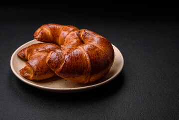 Delicious baked crispy croissants as an element of an invigorating, nutritious breakfast