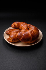 Delicious baked crispy croissants as an element of an invigorating, nutritious breakfast
