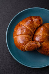Delicious baked crispy croissants as an element of an invigorating, nutritious breakfast