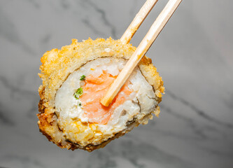 sushi with chopsticks