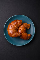 Delicious baked crispy croissants as an element of an invigorating, nutritious breakfast