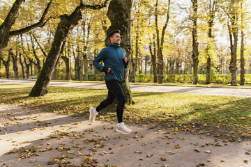 Fototapeta premium A hardy man doing a long daily workout, an active lifestyle, a man in sports clothes.