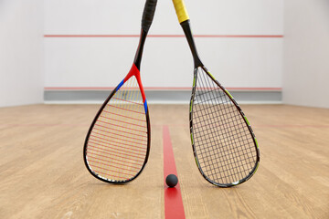 Closeup squash game racquet and ball training equipment
