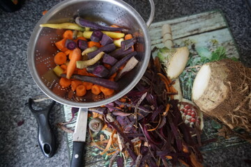 Chopped carrots, preparing vegetables for cooking, different colours of carrots