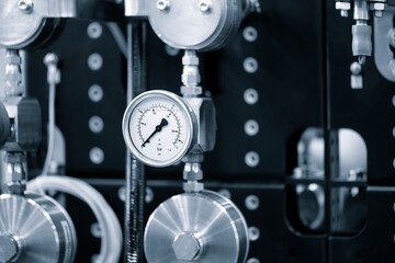 Pressure gauges mounted on the pipeline. Measuring instruments for pressure control. Industrial concept