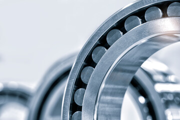 roller bearings on white background, blank for creativity close-up selective focus - obrazy, fototapety, plakaty