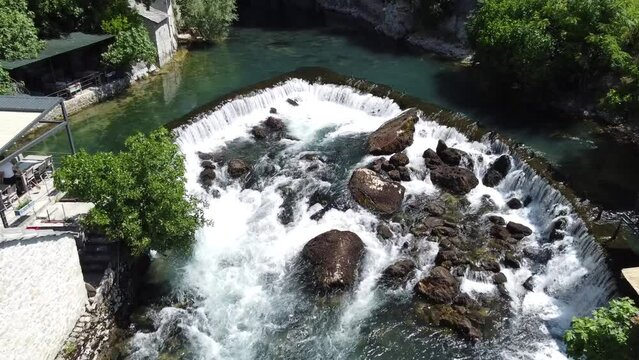 Crystal water flowing from the beautiful river drone video
