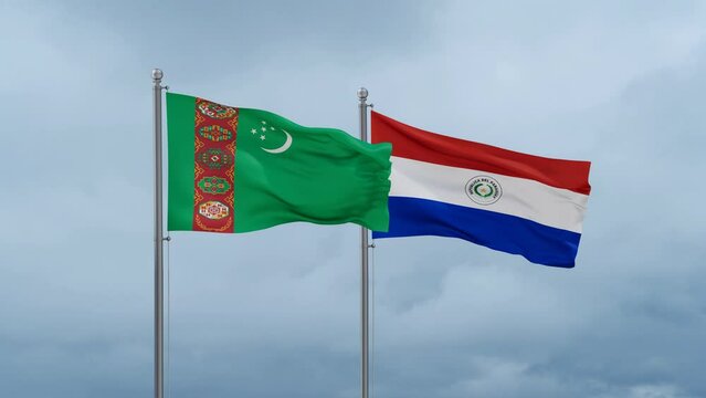 Paraguay flag and Turkmenistan flag waving together on cloudy sky, endless seamless loop, two country relations concept