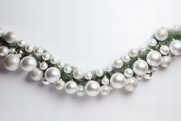 Obraz premium festive christmas tree garland with shiny ornaments border on a white background