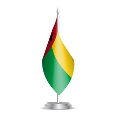 Guinea-Bissau flag - 3D mini flag hanging on desktop flagpole. Usable for summit or conference presentaiton. Vector illustration with shading.