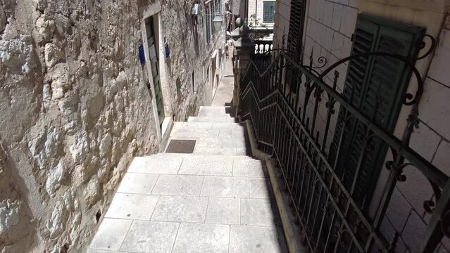 A camera moves down the staircase in the Old Town of Dubrovnik, Croatia