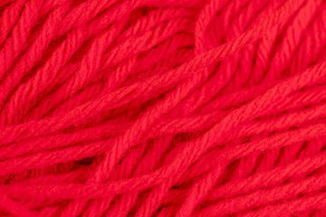 woolen threads of red color for knitting knitting close-up