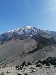 Fototapeta na wymiar Beautiful mountain views from above the clouds on Mount Kilimanjaro in Tanzania, Africa