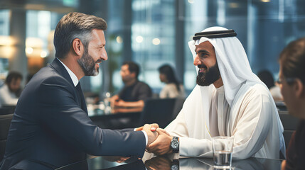 Arab investor and businessman shaking hands after an agreement and successful negotiation. - obrazy, fototapety, plakaty