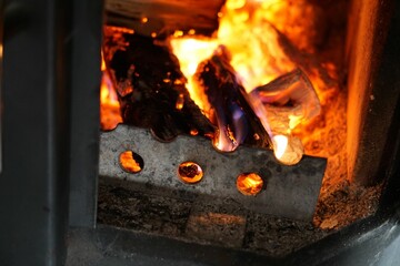 High-resolution closeup shot of a wood burning fire in a fireplace