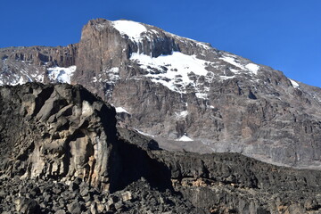 Hiking at high altitude above the clouds on Mount Kilimanjaro in Africa