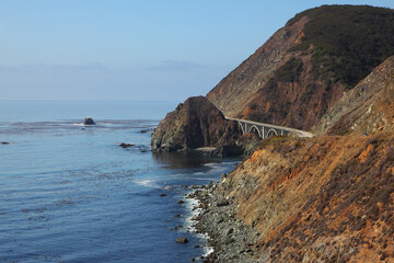 Fototapeta na wymiar The bridge on the coast of Pacific Ocean