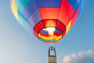 Preparing for hot air balloon launch to the sky.Show colorful hot air balloons flying on blue sky...