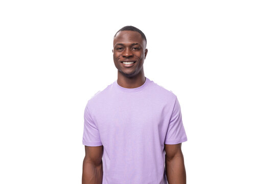 young charismatic american man dressed in a cotton t-shirt on a white background with copy space