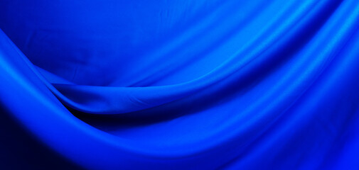 blue shiny flowing silk background