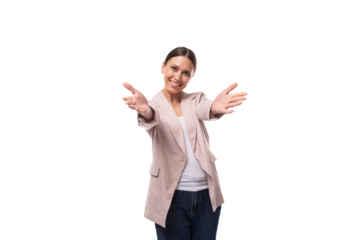 young pleasant brunette woman dressed in a beige jacket smiles and laughs on a white background with copy space