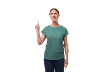 A 30 year old positive European brunette woman with a ponytail is dressed in a green T-shirt and jeans talks about advertising