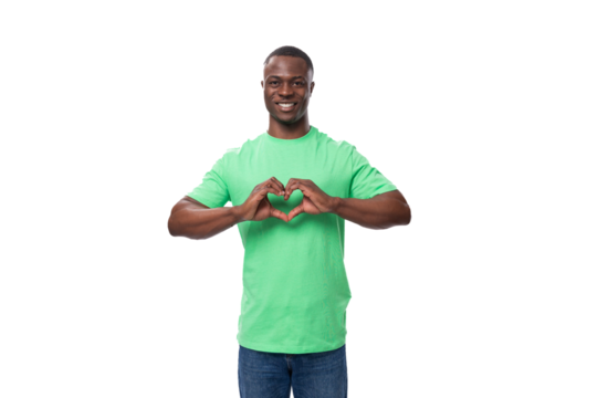 young friendly american man dressed in green t-shirt and jeans