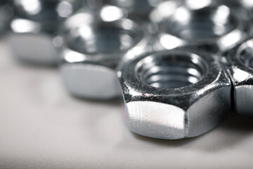 Metal nuts group on a table