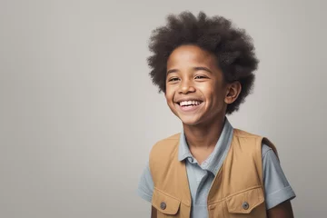Foto op Canvas young american boy with curly hair wearing casual coat and jacket standing over isolated white background with a happy and cool smile on face. lucky person.young american boy with curly hair wearing c © Shubham