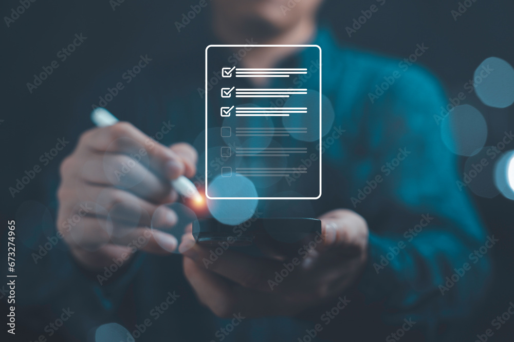 Poster businessman using electronic pen to tick correct sign mark in online document checklist for quality 
