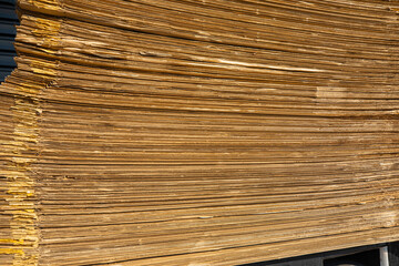 Paper pile and piece of cardboard at the recycle industry