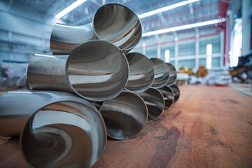 Stainless steel piping elbow component
