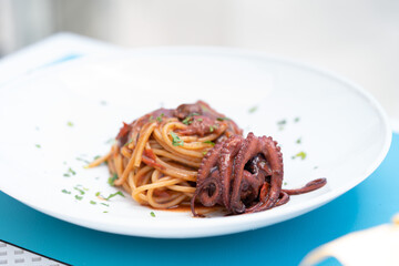 Spaghetti di Gragnano alla Luciana (with real octopus), bronze drawn pasta from Gragnano, spaghetti with octopus and piennolo tomatoes