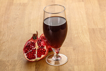 Sweet pomegranate juice in glass