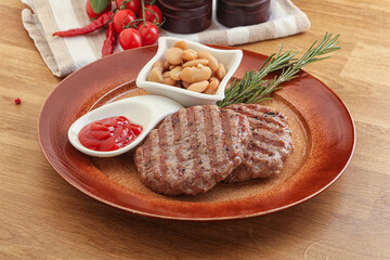 Grilled beef burger cutlet with sauce