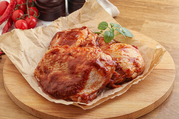 Marinated chicken leg in tomato sauce