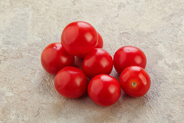 Ripe juicy cherry tomatoes heap