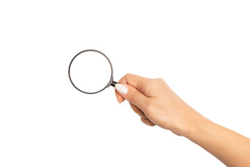 An elegant female hand with a beautiful manicure holds a magnifying glass. Mockup or template with round empty space for text and design, isolated on white background.