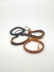 Handcrafted bracelets with various strands and colors. 