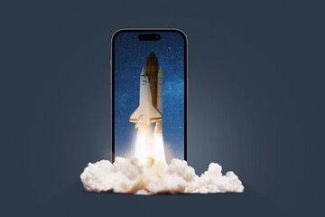 Rocket shuttle successful launch on a smartphone on a dark background, concept. Start up, gadget and take off of a spaceship with smoke. Overflow, creating an idea. Think differently. App