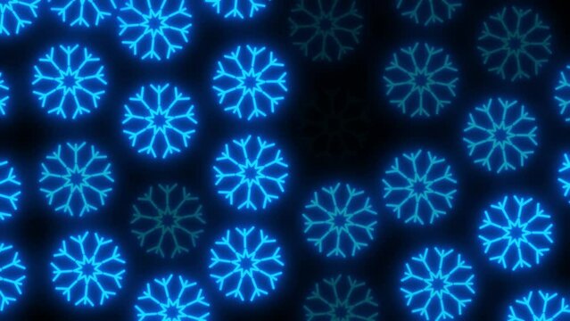Neon blue snowflakes on a black screen. Stock winter background in 4K with alpha channel. Motion graphics for a Christmas video transition or clip decoration.