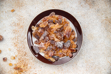 rock sugar crystals pieces candy brown sugar candied big rock caramel taste cane sugar healthy eating cooking appetizer meal food snack on the table