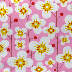 Floral pattern cotton fabric design closeup in pink and white
