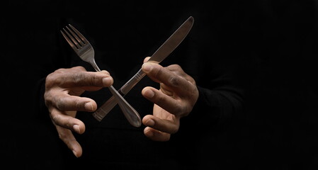 silverware utensils with knife fork and spoons with black background no people stock image stock photo - obrazy, fototapety, plakaty