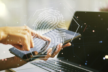 Multi exposure of abstract creative fingerprint illustration with finger presses on a digital tablet on background, digital access concept